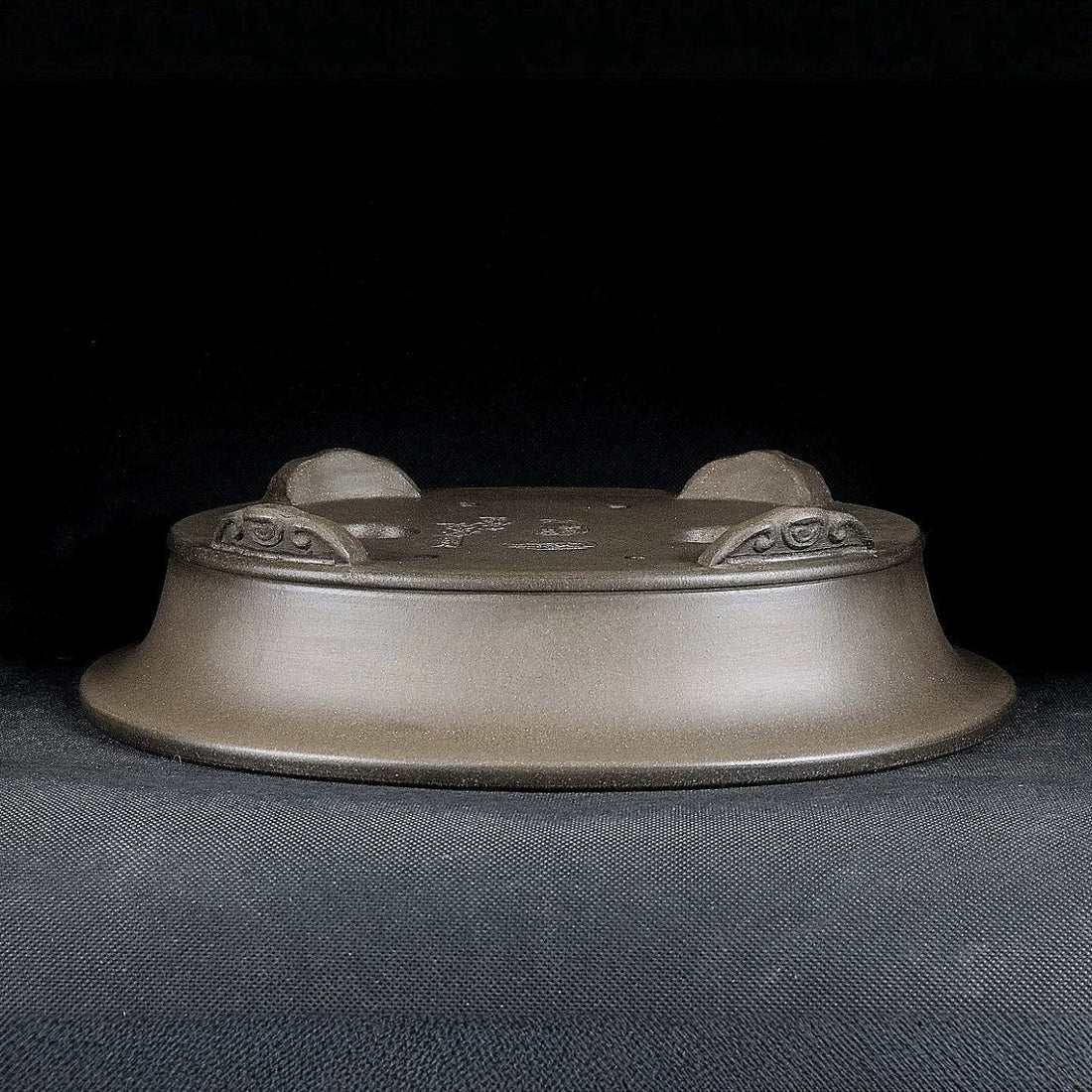 10.2 inch (26cm) Large Oval Unglazed Beige Bonsai Pot w Flared Rim & Cloud Feet Upside Down View