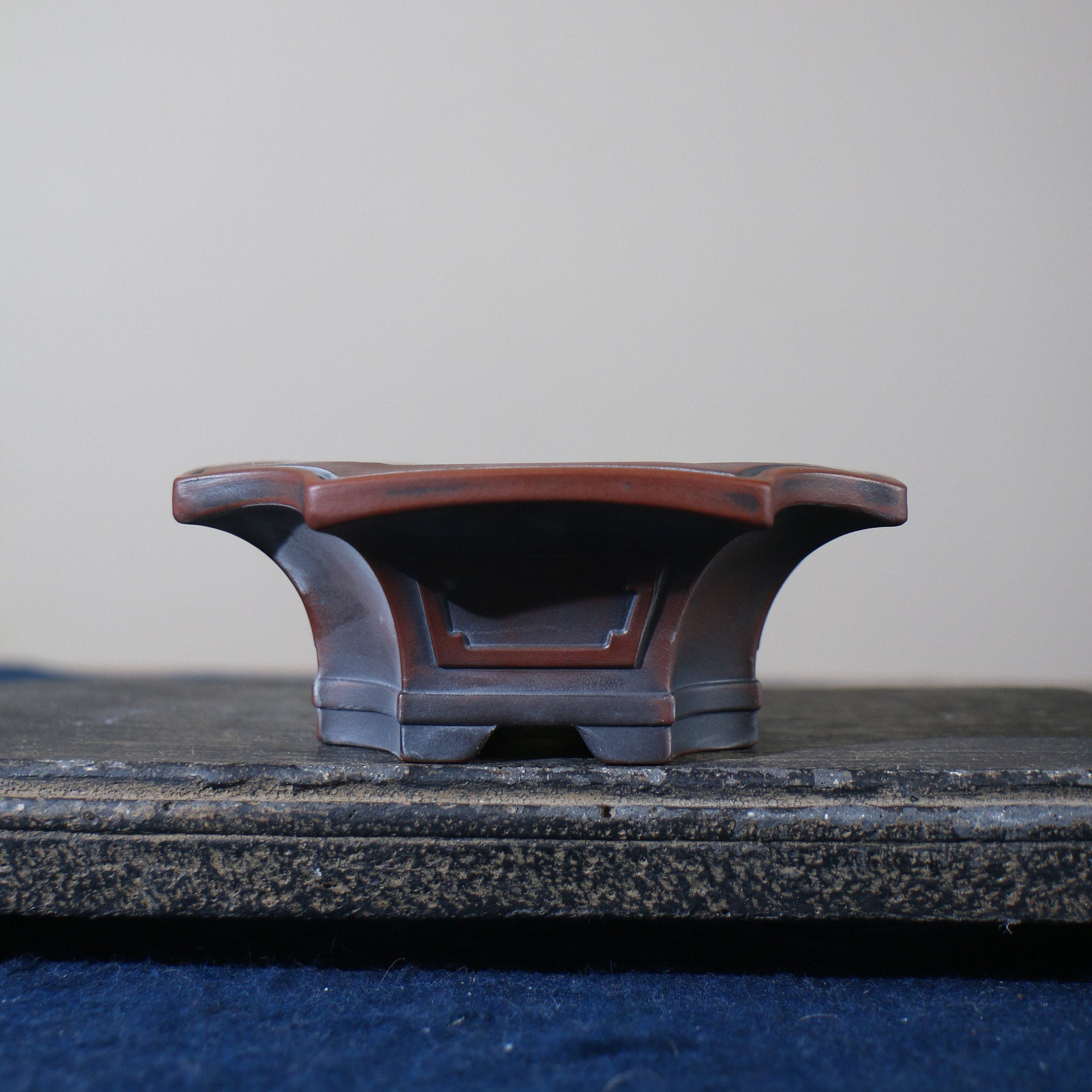 5 inch (12.8cm) Corner-Cut Flared Rectangular Reddish Brown-Black Dual-Tone Unglazed Bonsai Pot Side View