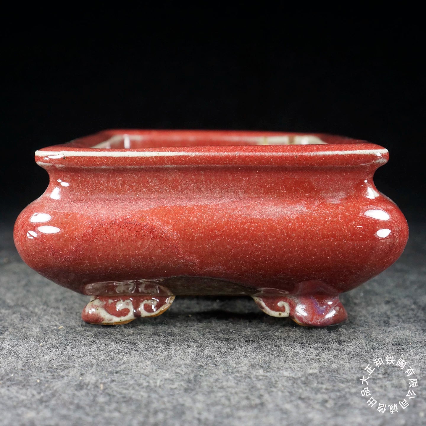 8.4 inch (21.5cm) Bulged Rectangular Pink-Red Jun Glaze Bonsai Pot with Cloud Feet Side View
